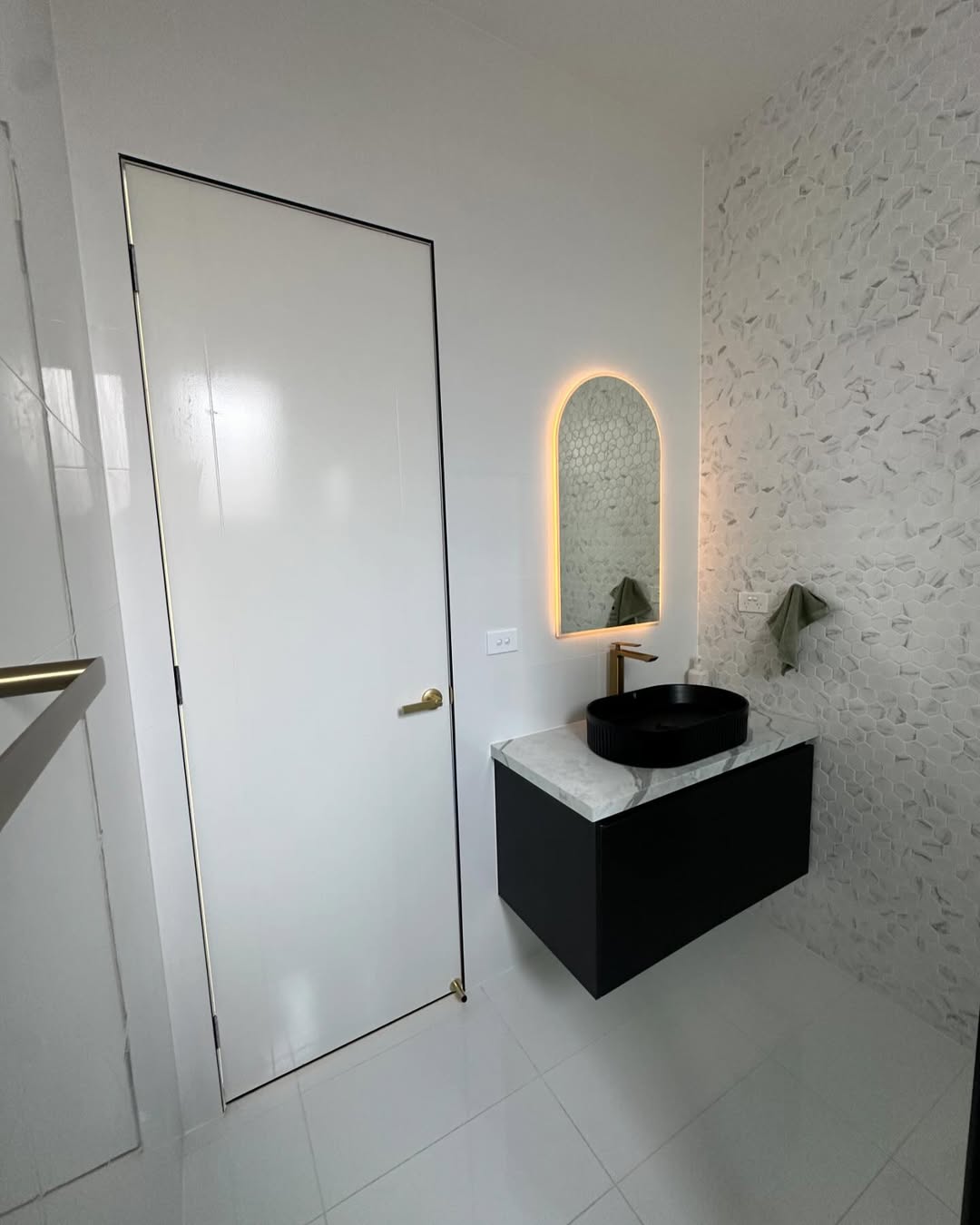 Floating vanity with arch LED mirror